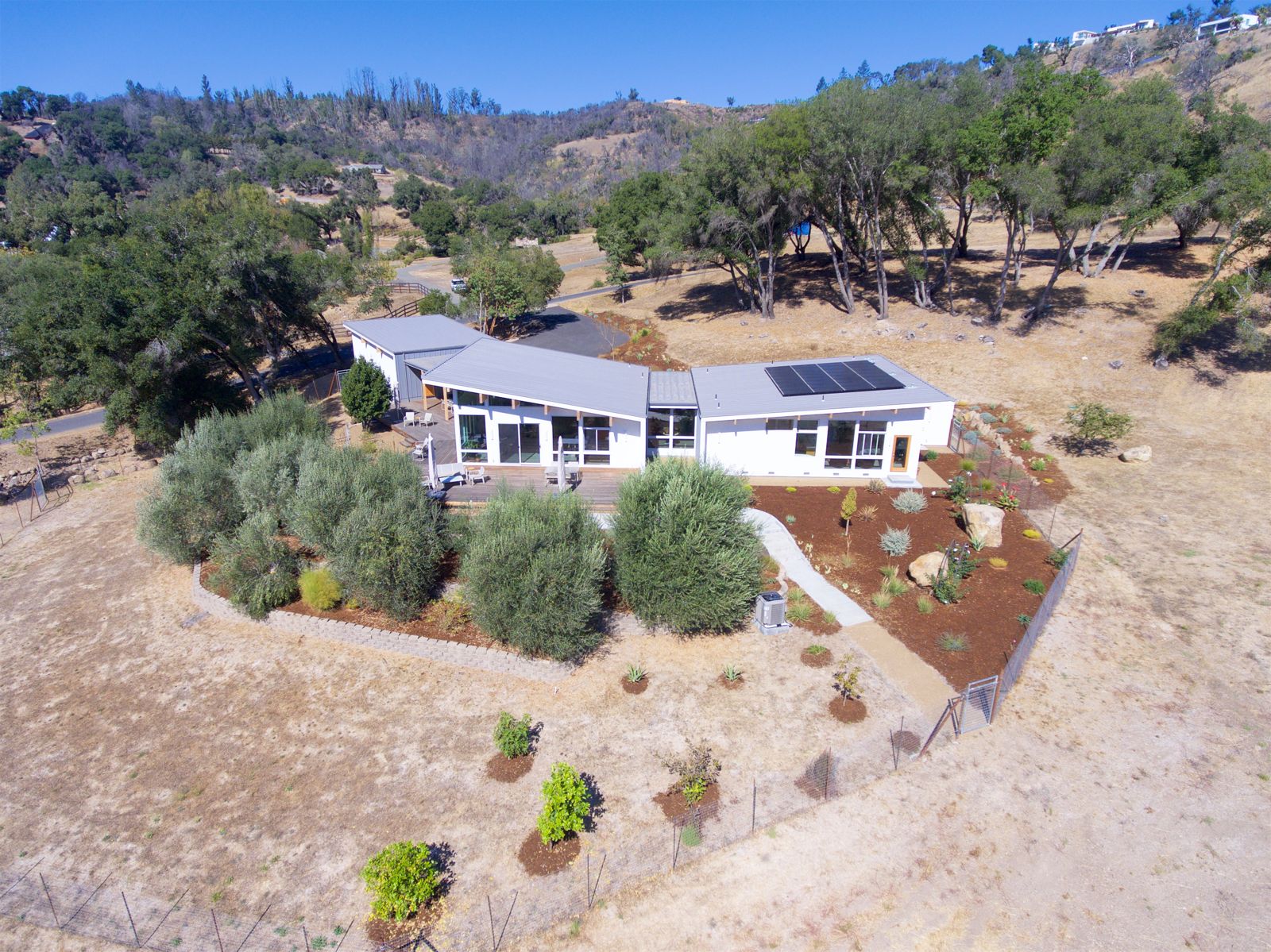 Completed wine-country home on an oak-studded hillside site