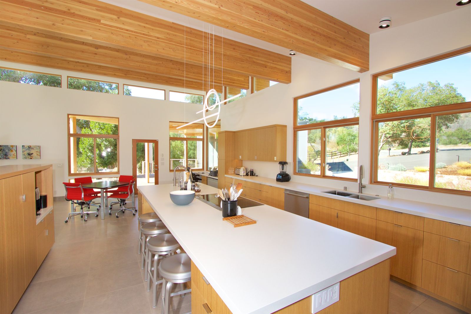 Open great-room kitchen under vaulted beams