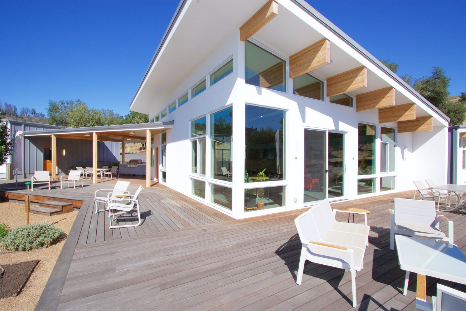 Deck and clerestory glazing on a hillside site