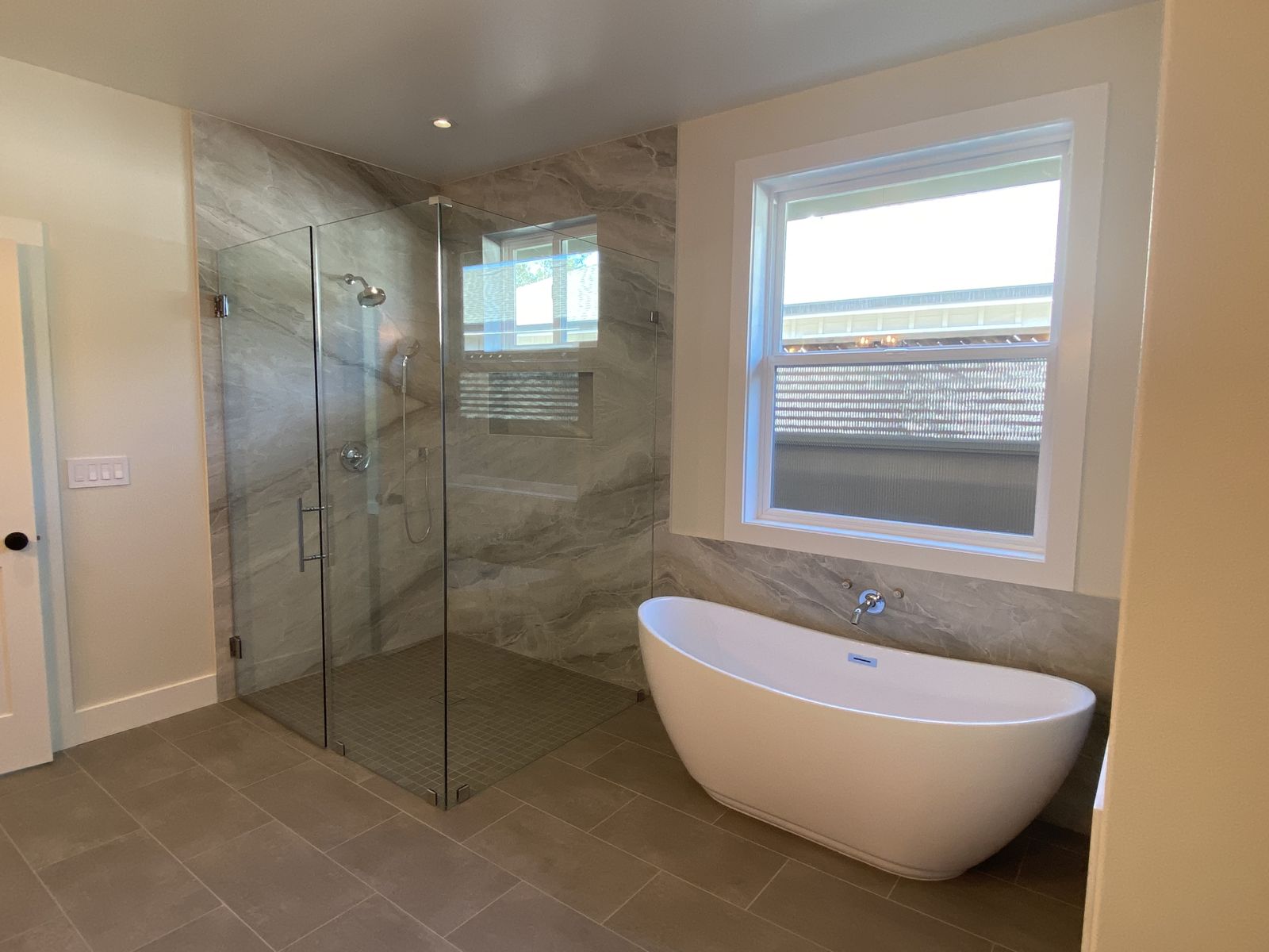 Bath remodel — soaking tub under the window